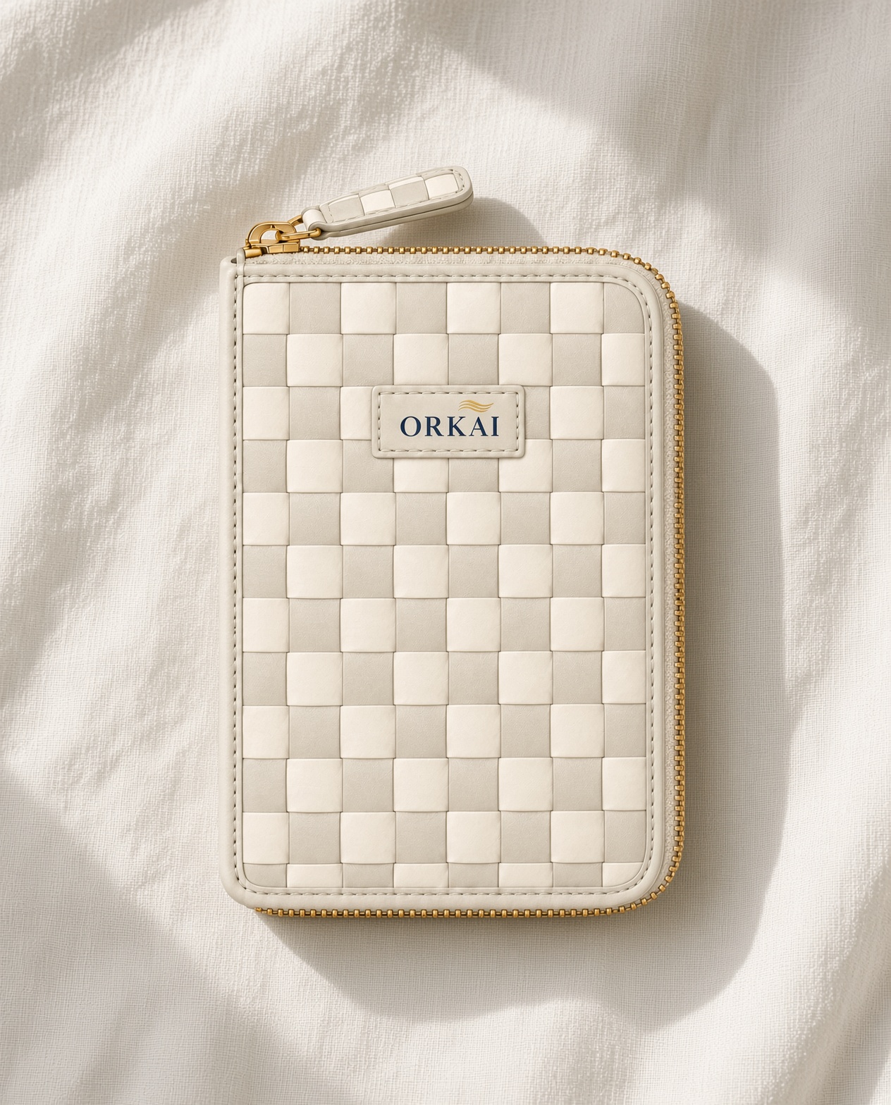 The passport wallet on morning linen.