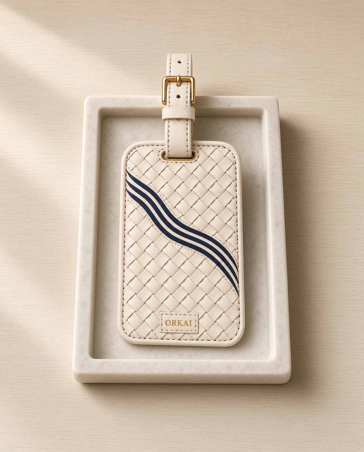 The luggage tag on a pale tray.