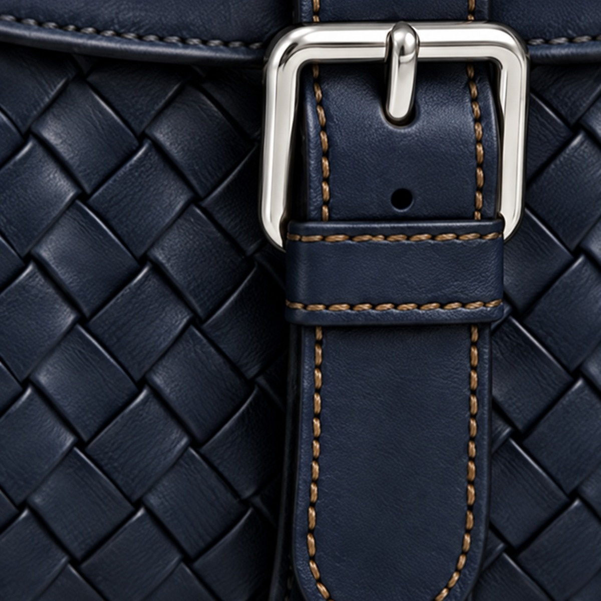 Polished silver hardware on ORKAI™ leather.